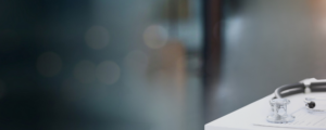 Stethoscope on a clinical document, highlighting control of agency staffing and workforce governance
